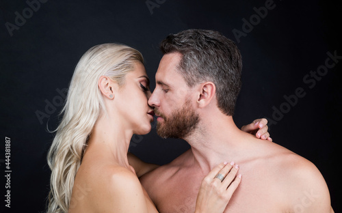 sexy couple in love of woman and man with naked body kiss, eroticism