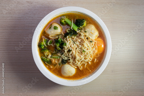 A bowl of spicy noodle soup.