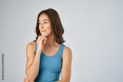 joyful woman in blue t-shirt fashion hairstyle posing glamor