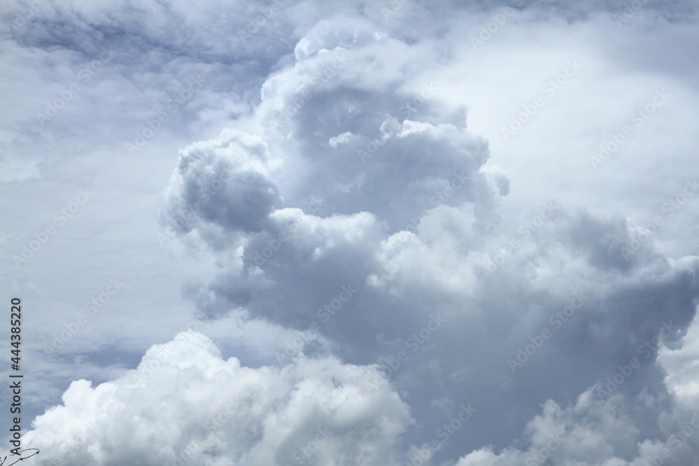 Dirty white clouds float in the sky. Dirty white clouds float in the sky.