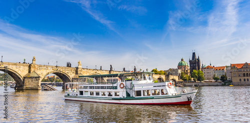 Panorama of a tourist boat on the river Vltava in Prague, Czech Republic