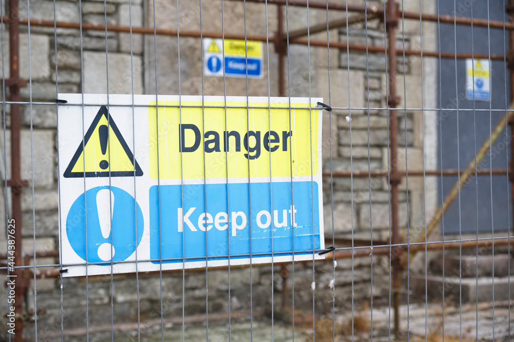 Construction site health and safety message rules sign board signage on fence boundary Construction site health and safety message rules sign board signage on fence boundary