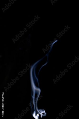 Smoke steam. Blur white smoke, abstract fog or steam mist cloud isolated on black background. Steam flow in pollution, vapor cigarette, gas, dry ice.