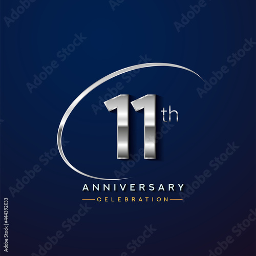 11th anniversary logotype silver color with swoosh or ring, isolated on blue background for anniversary celebration event.