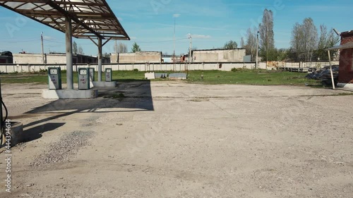 old abandoned car gas station. drone aerial