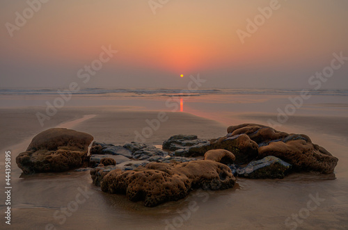 Beautiful and colorful sun setting over the sea, Kokan, Maharashtra, India. photo