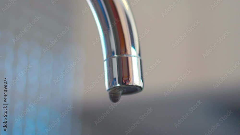 Water dripping from the tap in slow motion 180fps Water dripping from the tap in slow motion 180fps