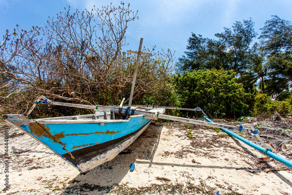 Blue and white fishing boat on the beach of Gili Air, Indonesia, Southeast Asia