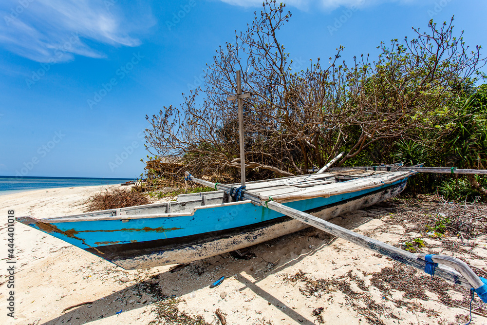Blue and white fishing boat on the beach of Gili Air, Indonesia, Southeast Asia