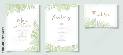 Wedding invitation template with tropical palm leaf design
