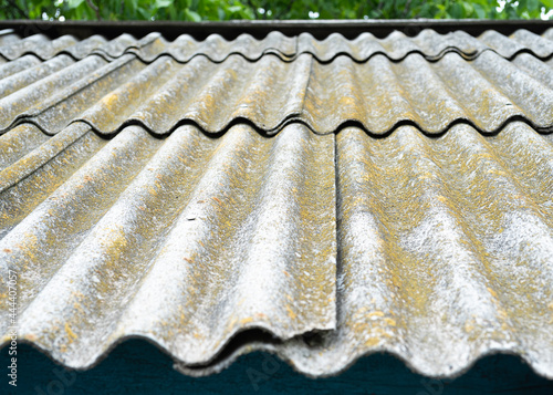 Roof of a country house, covered with gray slate, close-up