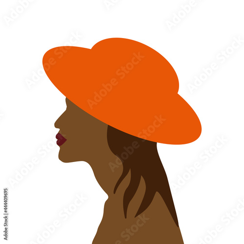 beautiful tanned woman with long hair in a red hat