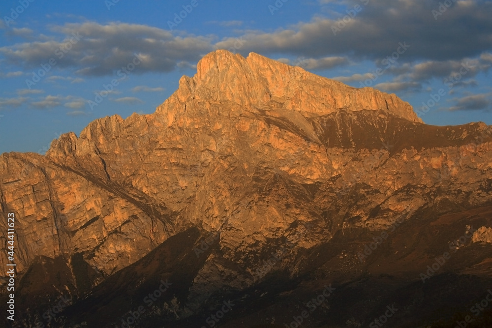 Caucasus, Ossetia. Alagir gorge. South face of Kariou peak at sunset. 