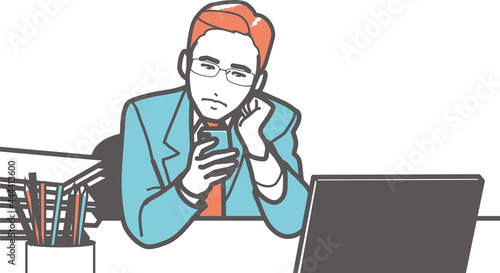 スマホを見て落ち込む男性