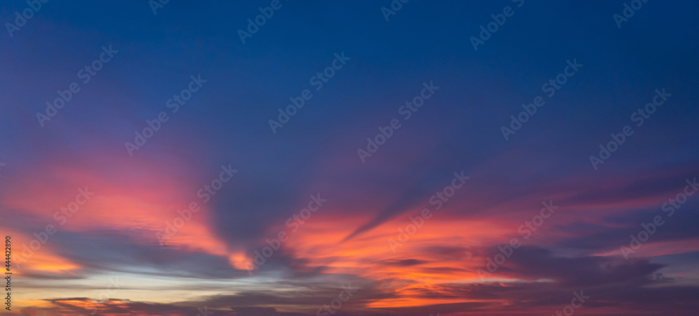 Panorama photo of dramatic sky at beautiful sunset