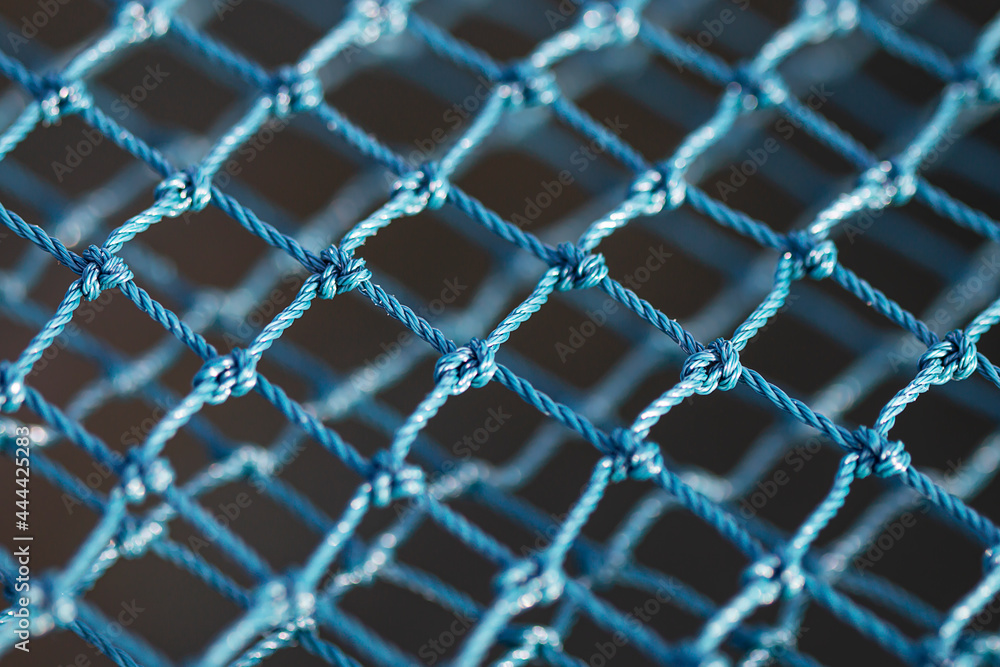 Fototapeta premium green nylon rope mesh background.