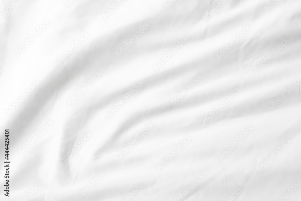 Naklejka premium Close up of bedding White sheets with copy space.