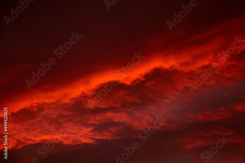 Red sunset sky with dramatic clouds