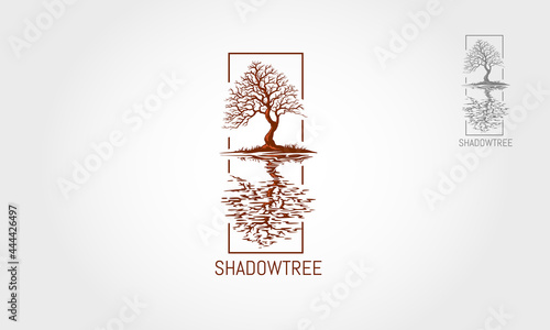 Shadow Tree Vector Logo Illustration.  This beautiful tree is a symbol of life, beauty, growth, strength, good health, recycling, environment associations, landscape business, etc.