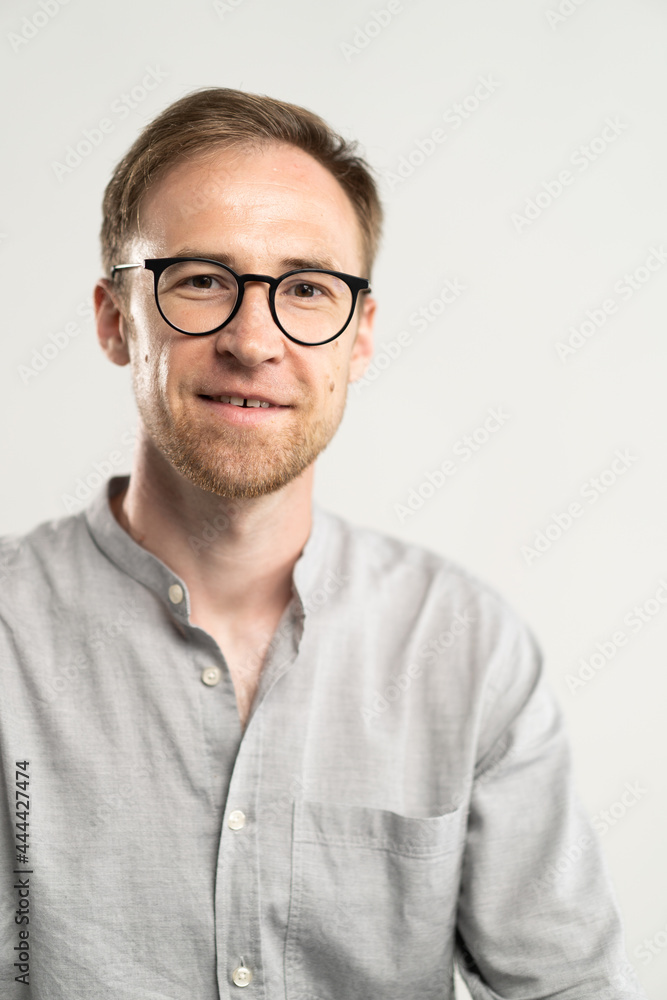 portrait of a man with glasses