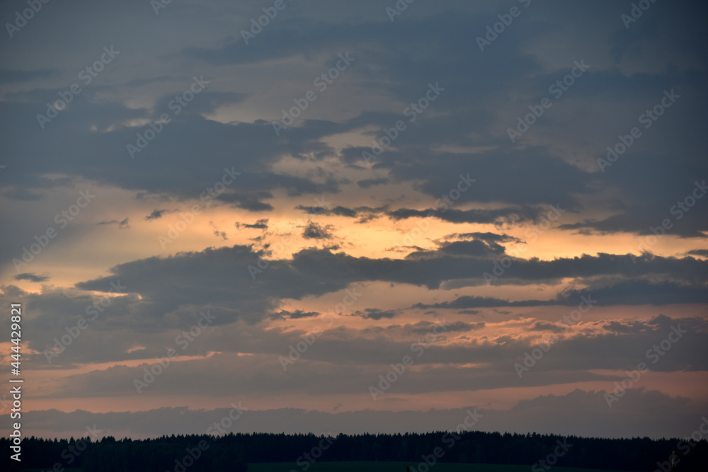 Red sunset with blue clouds in the evening