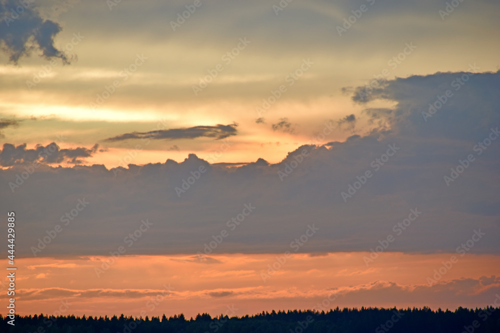 Red sunset with blue clouds in the evening