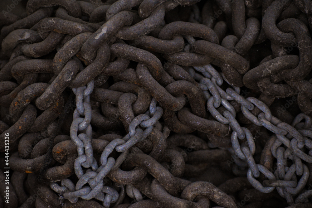 rusted iron chain found in an industrial area rusted iron chain found in an industrial area