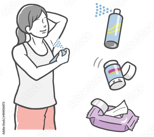 腋臭対策に制汗剤を使う若い女性