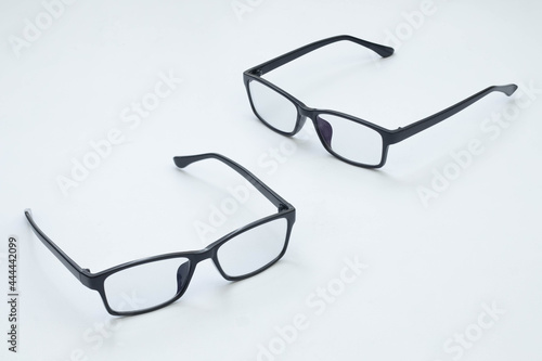 Black frame glasses isolated on white background. white board