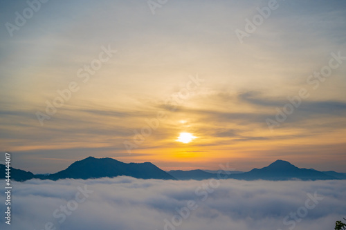 Beautiful sunrise with sea of fog in the early moring at phu thok chiang khan district leoi city thailand.Chiang Khan is an old town and a very popular destination for Thai tourists