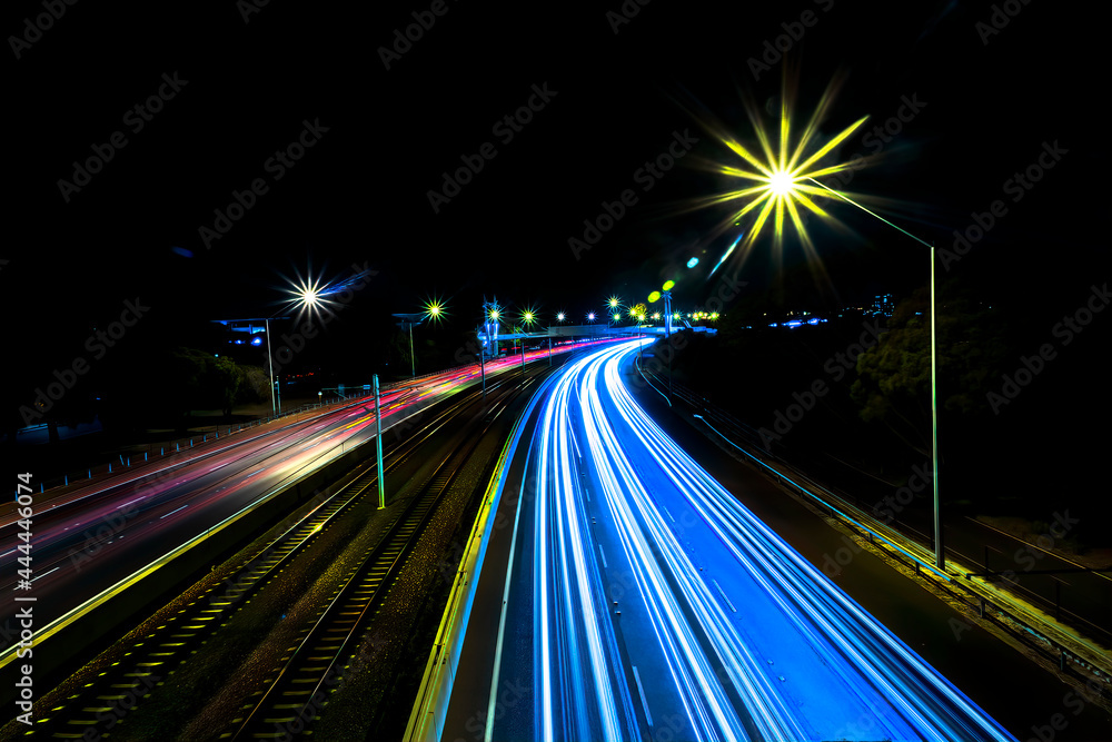 Light trails on a motorway at night, Perth, Western Australia, Australia Light trails on a motorway at night, Perth, Western Australia, Australia