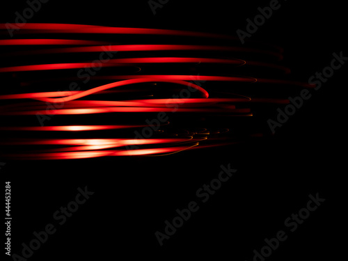 Red lines of light on a black background