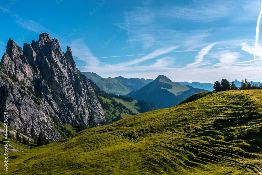 Fototapeta premium Landscape view of Gastlosen mountain area, with clear skies in the background, shot in Jaun, Fribourg, Switzerland