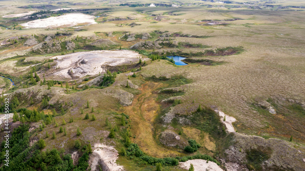 Landscape of the forest-tundra and the sandy river bank, photo from quadrocopter, bird's eye view.Arctic Circle, tunda