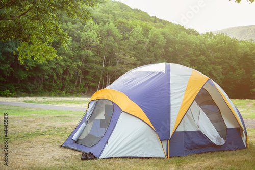 Concept of camping. Camping tent at a campsite.