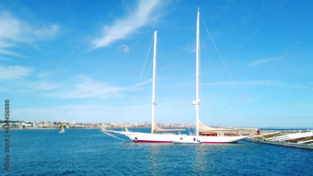 Sailboat moored in a marina in a summer day Sailboat moored in a marina in a summer day