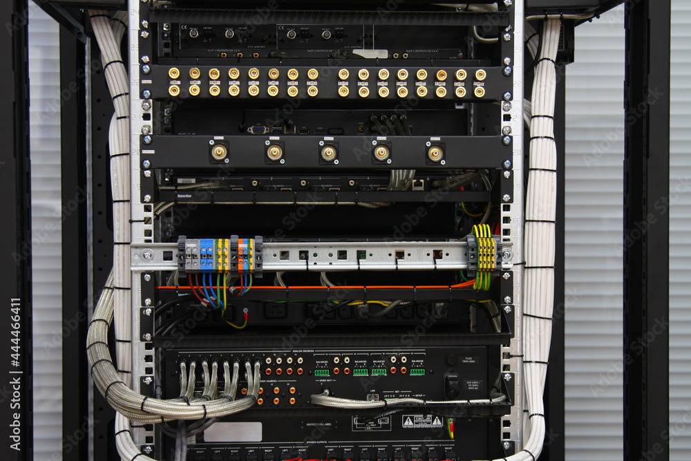 Low-current rack of electronic equipment for the Internet and multiroom. Connecting wires using connectors and jacks.
