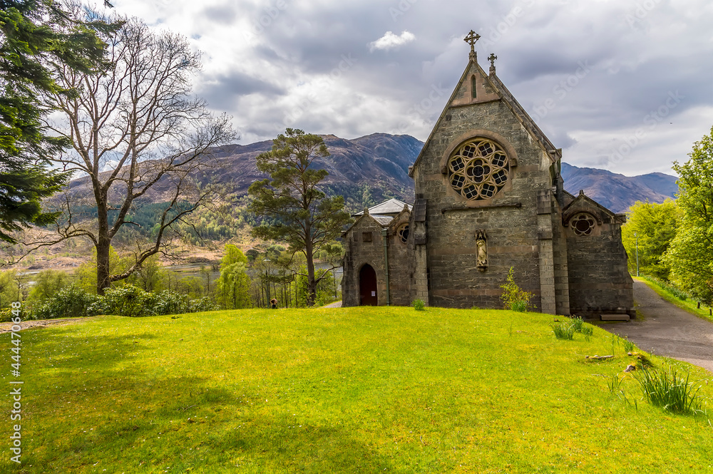 A view towards a church above Glenfinnan, Scotland on a summers day