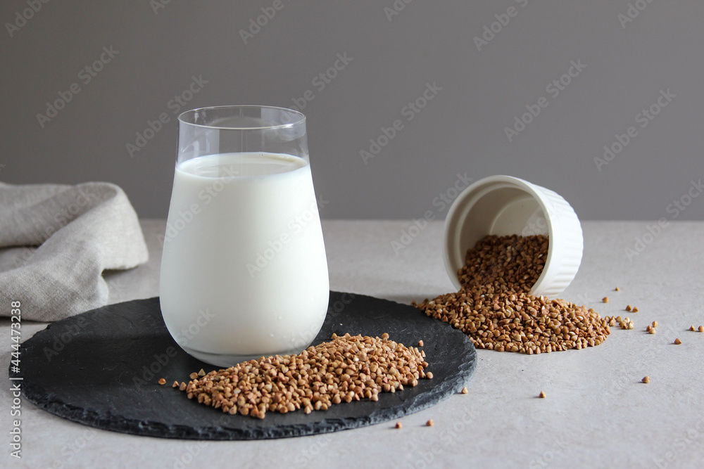 Vegan milk from buckwheat on the table. Vegan or vegetarian milk. Vegetables milk. Vegan milk from buckwheat on the table. Vegan or vegetarian milk. Vegetables milk.