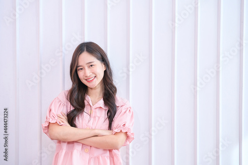 Happy woman smile on white wall background Free Download Happy woman smile on white wall background - GFXLoad