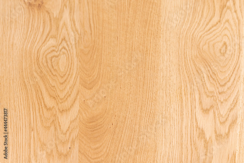 Oak wood background varnished in light tones showing its beautiful veins. Light wood texture vectors for background.