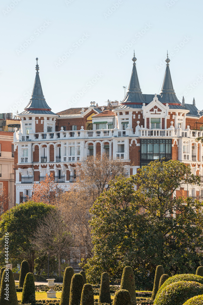 View of buildings with unique roofs in the center of Madrid, next to the Retiro park.