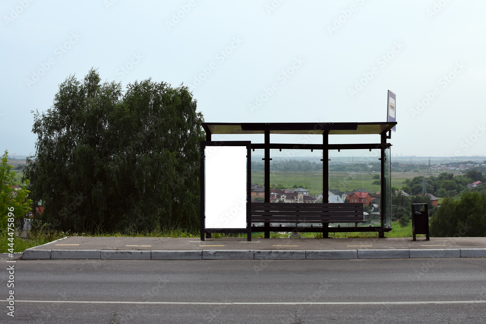 Vertical white billboard at a bus stop on a street. background with buildings and road. Make fun of. A poster on the street next to the roadway. Summer day. Empty stop.Waiting place for bus
Vertical white billboard at a bus stop on a street. background with buildings and road. Make fun of. A poster on the street next to the roadway. Summer day. Empty stop.Waiting place for bus