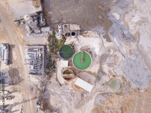 Quarry stone. Mining and processing plant, mineral piles and sand Industrial building.