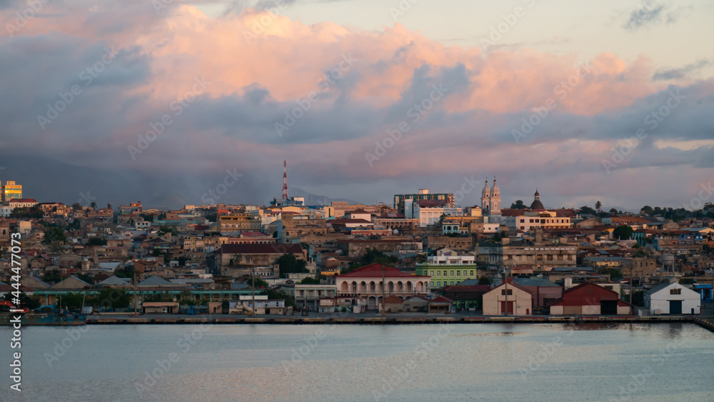 Beautiful view if Santiago de Cuba city during sunset from the port side