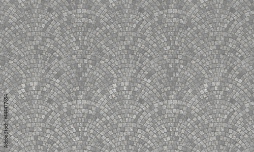 Top view on street arched stone pavement