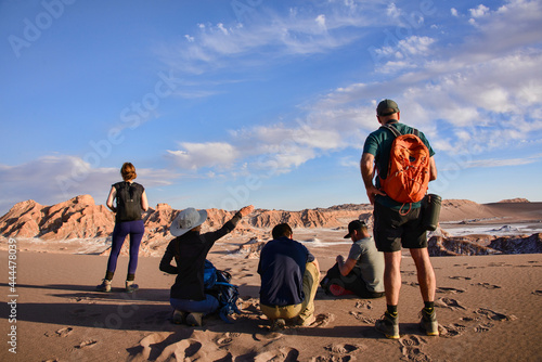Trekking through the desert landscape in the Moon Valley, San Pedro de Atacama, Chile photo