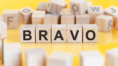 word bravo written on wood blocks, concept photo