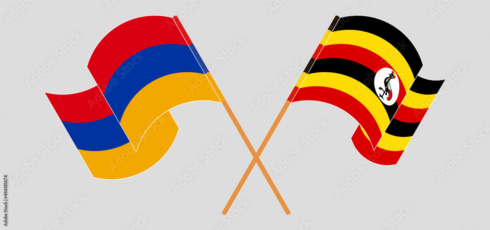 Crossed and waving flags of Armenia and Uganda Crossed and waving flags of Armenia and Uganda