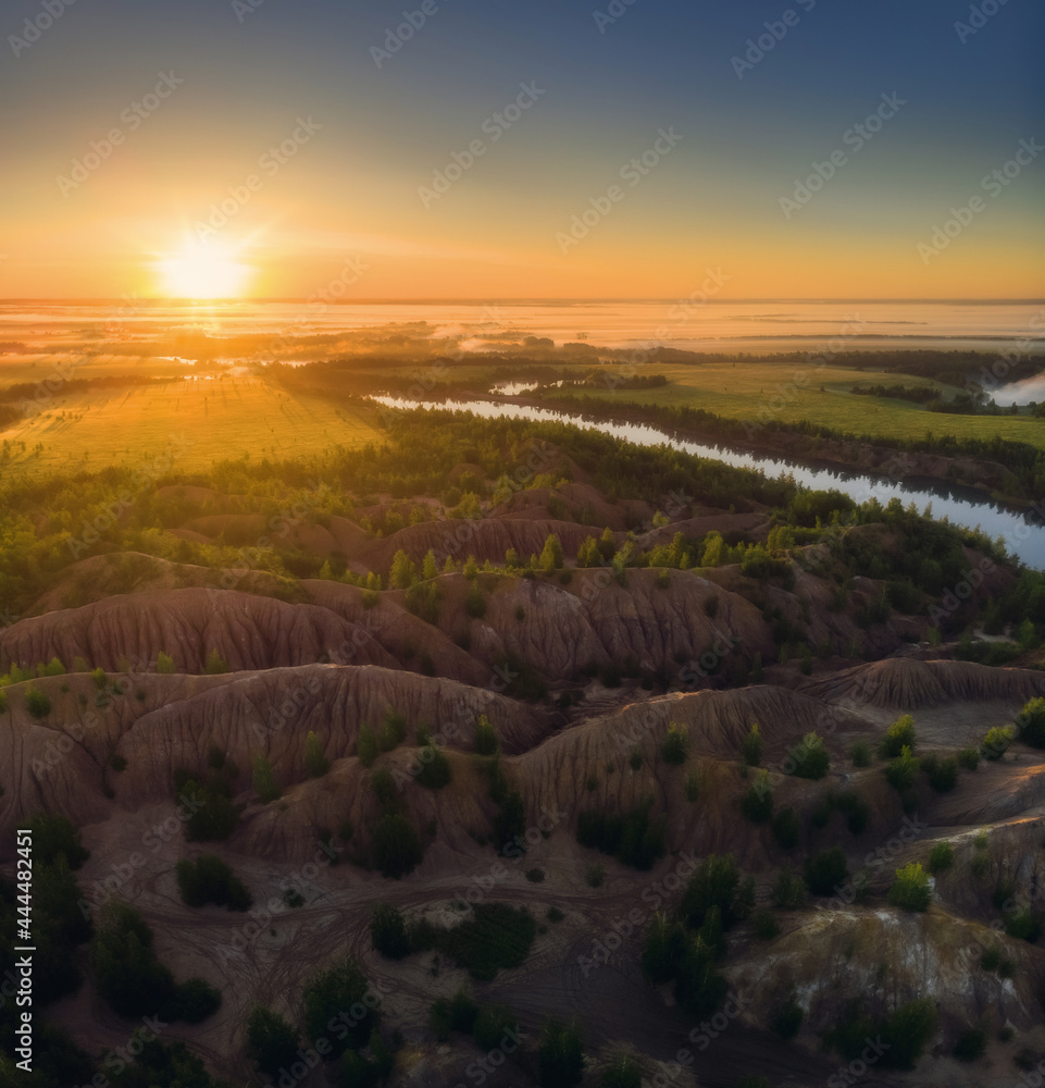 Aerial drone view of nature landscape. Colorful sunrise in Romantsevskiye Gory, Konduki in morning. Tula oblast, Russia. Popular weekend destination